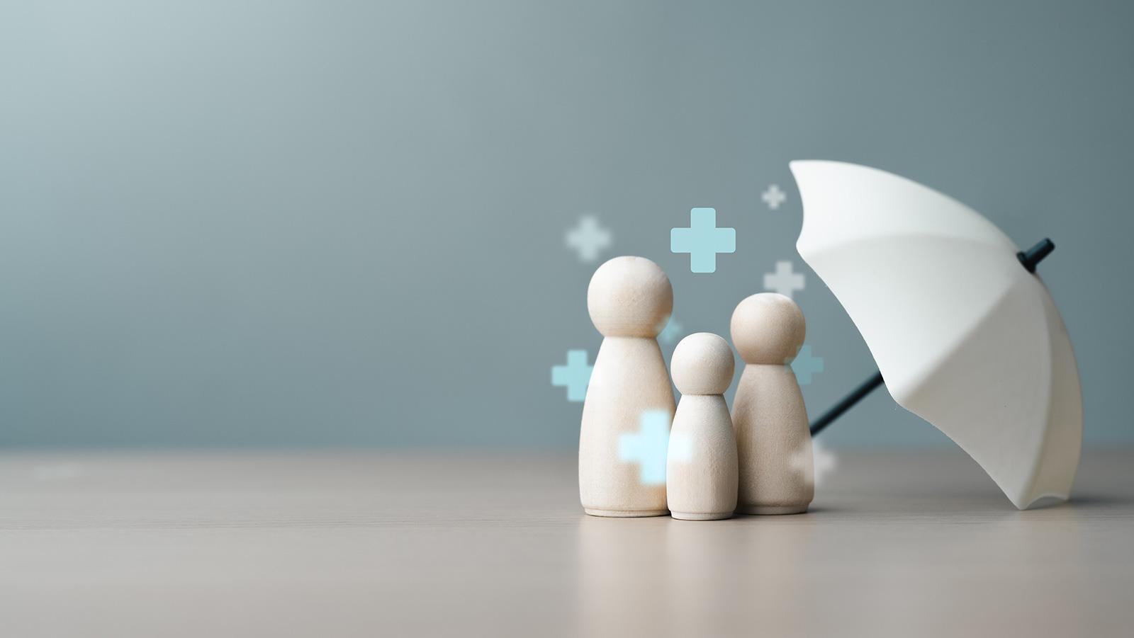Darstellung einer Familie vor der Gesundheitsreform 2027 mit Schirm
